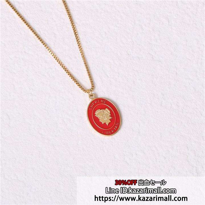 Supreme libertad gold on sale pendant